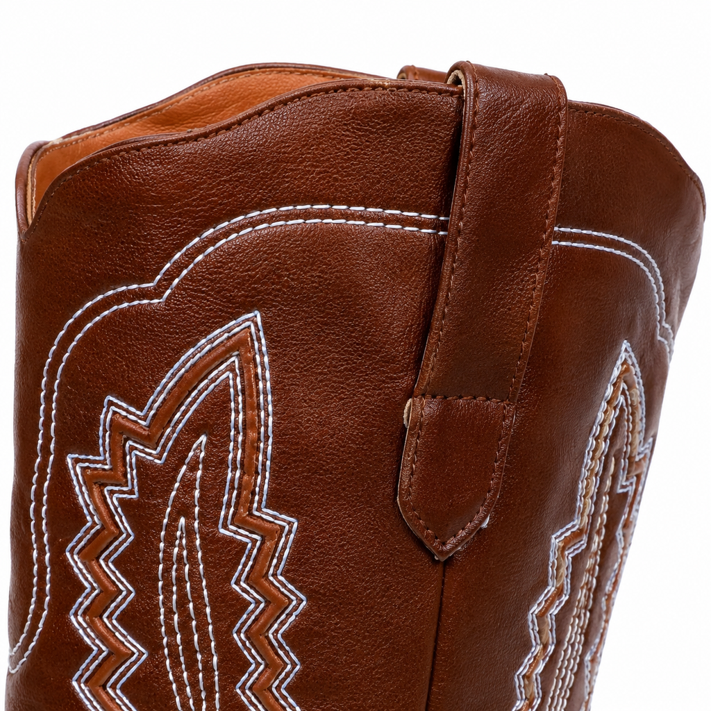 Rich Brown Women's Pointed-Toe Stacked-Heel Leather Embroidered Knee-High Boots close-up detail