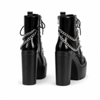 Black Patent Braga Patent Leather Block-Heel Boots heel detail