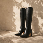 Deep Black Simona Leather Knee-High Boots styled scene