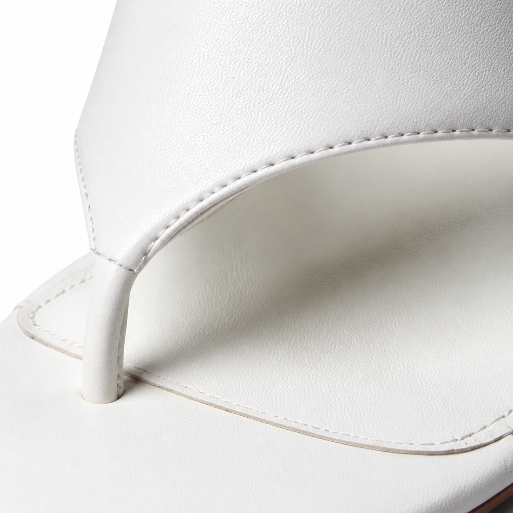 Cream Ivory Carlotta Leather Wedge Thong Sandals close-up detail