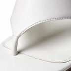 Cream Ivory Carlotta Leather Wedge Thong Sandals close-up detail