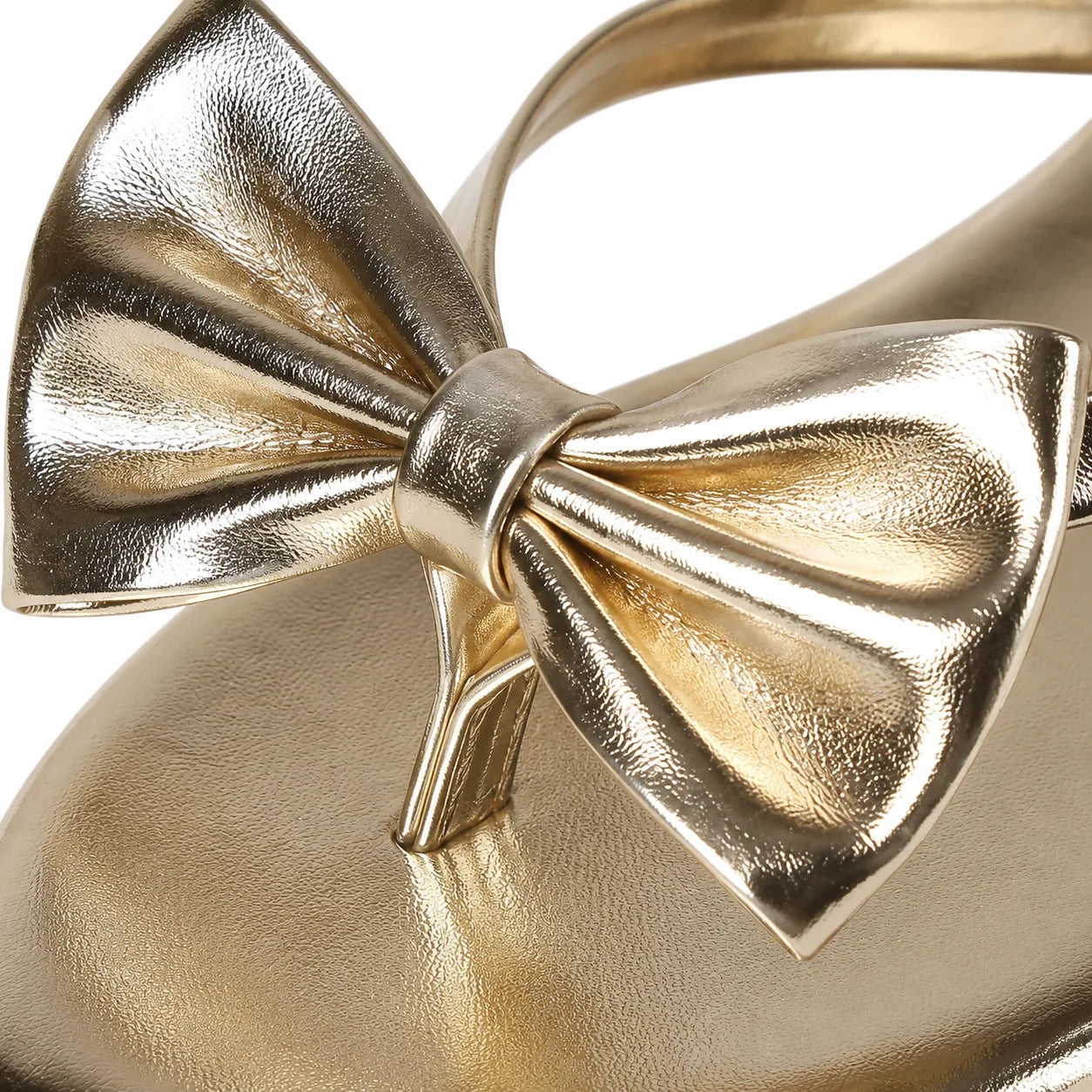 Warm Gold Luciana Bow Leather Slides close-up detail