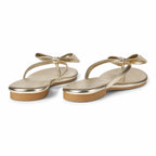Warm Gold Luciana Bow Leather Slides heel detail