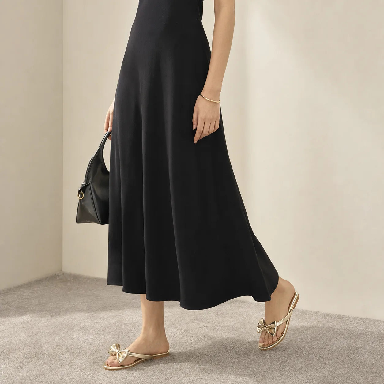 Warm Gold Luciana Bow Leather Slides lifestyle scene
