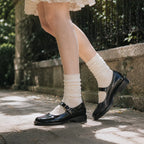 Deep Black Subiaco Buckle Leather Flats on-foot view