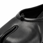Deep Black Torgiano Leather Slip-On Mules close-up detail
