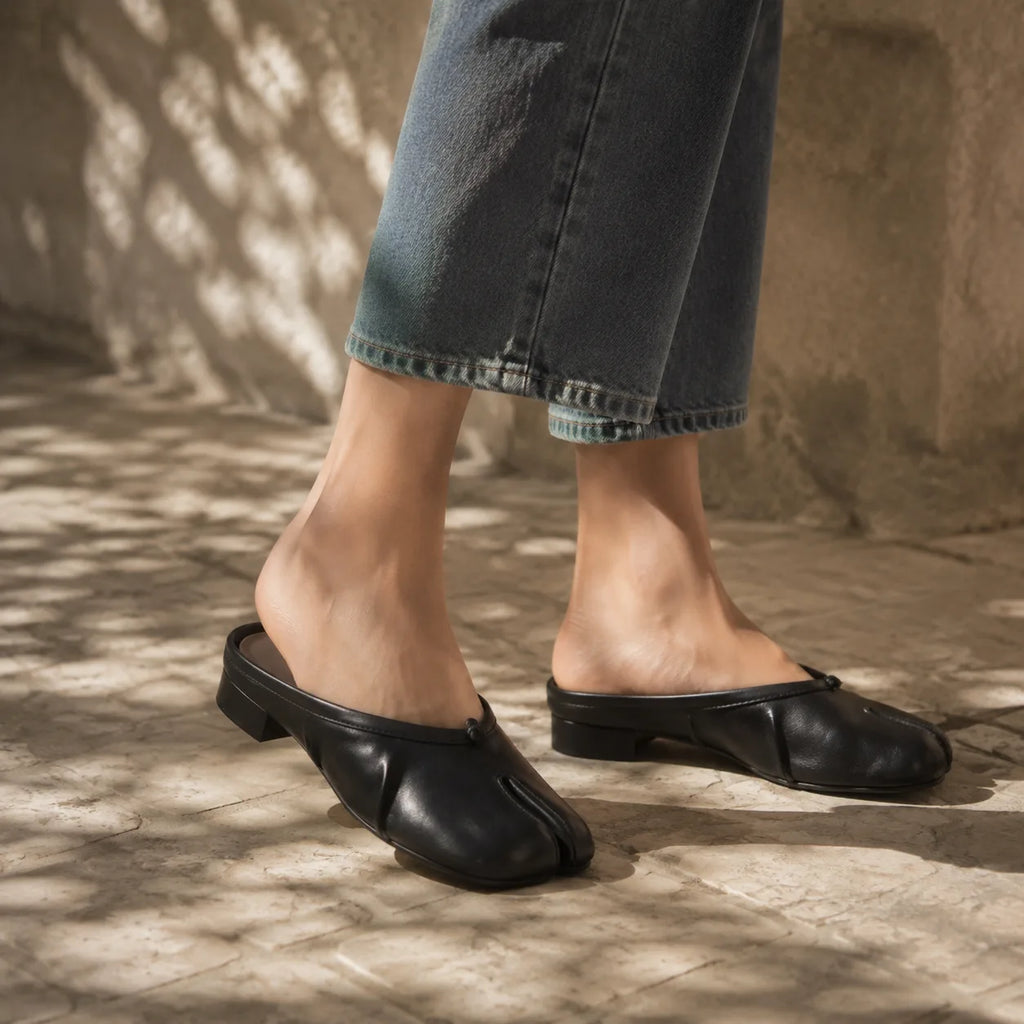 Deep Black Torgiano Leather Slip-On Mules on-foot view