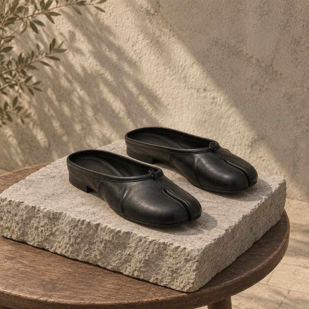 Deep Black Torgiano Leather Slip-On Mules styled scene