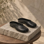 Deep Black Torgiano Leather Slip-On Mules styled scene