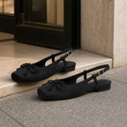 Deep Black Andros Bow Lace-Up Flats styled scene